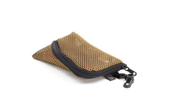 A Mini Ghost Whale Pouch in Coyote (tan) mesh.